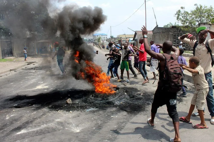 An incendiary device is thrown into a crowd at ongoing M23 protests in the Democratic Republic of the Congo 