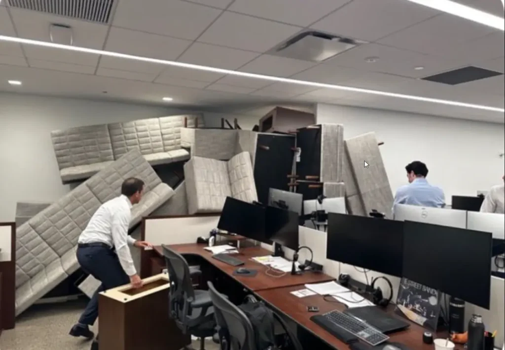 Employees inside a financial office on one of the upper floors created a makeshift barricade using couches, desks, and partition walls to shield themselves from the shooter during the July 28, 2025 New York City attack. 