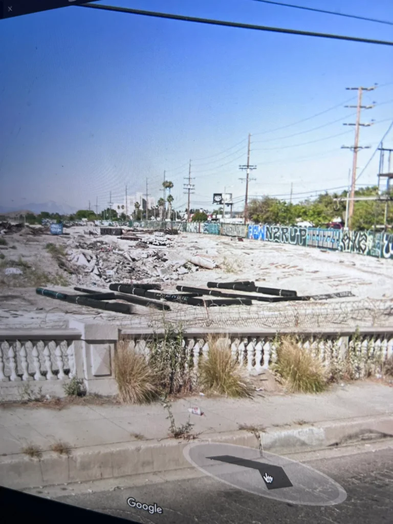 A photo of a large "Help" sign made out of piping found near Union Pacific's Los Angeles railroad yard.