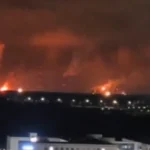 A photo of the Ryazan oil refinery on fire after some explosions.