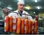 A photo of a Serbian sausage maker illustrating USAID's Top 10 Failures, No. 6: $200 Million Disaster: How the CRDA Program in Serbia Wasted Taxpayer Money