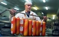 A photo of a Serbian sausage maker illustrating USAID's Top 10 Failures, No. 6: $200 Million Disaster: How the CRDA Program in Serbia Wasted Taxpayer Money