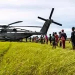 a photo of a helicopter evacuating USAID staffers from a warzone illustrating Humanitarian Aid vs Geopolitics Why USAID is a Political Tool