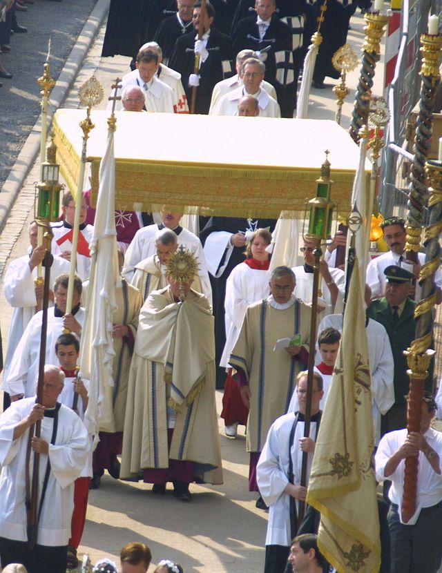 A Catholic procession led by traditionalist clergy, reinforcing the push for doctrinal conservatism after Pope Francis.
