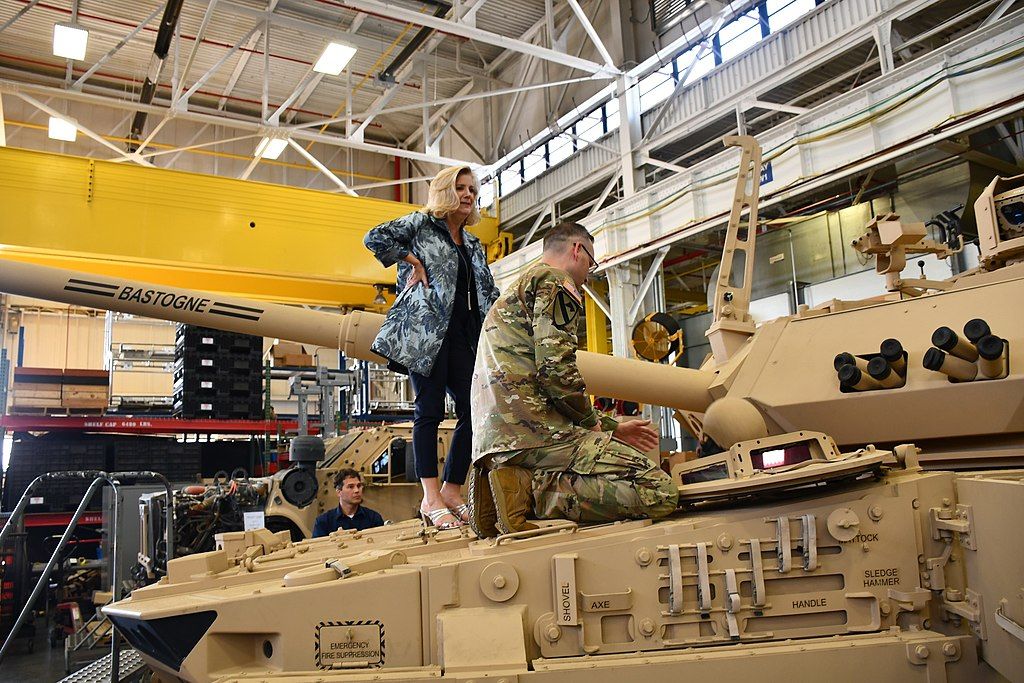Secretary of the Army Christine Wormuth stands atop a Mobile Protected Firepower vehicle at the Detroit Arsenal Prototype Integration Facility in August 2022. 
U.S. Army - https://twitter.com/devcom_gvsc/status/1557364582775197696/photo/1
