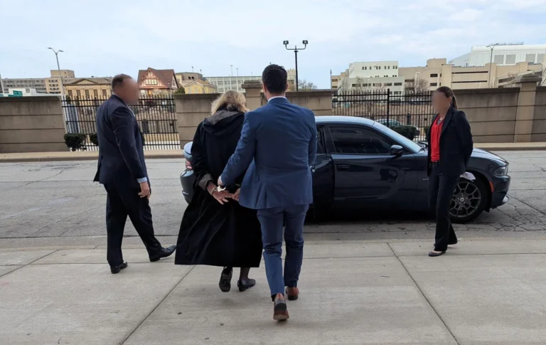 an image depicting April 25, 2025: The Death of American Democracy Began With a Judge in Handcuffs