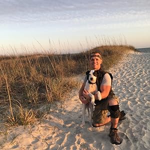 a photo of Nigel Edge and one of his dogs